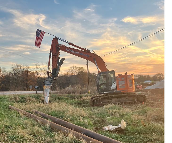 Excavator Flag Sunset
